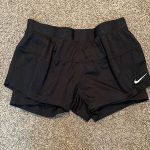 nike double lined athletic black shorts.
